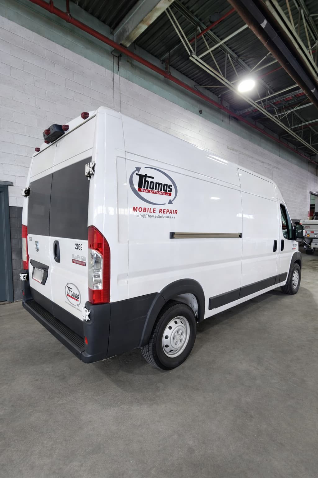 Thomas Solutions work trucks
